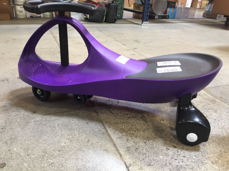 Photo 2 of Wiggle Car Ride On Toy – No Batteries, Gears or Pedals – Twist, Swivel, Go – Outdoor Ride Ons for Kids 3 Years and Up by Lil’ Rider (Purple)
