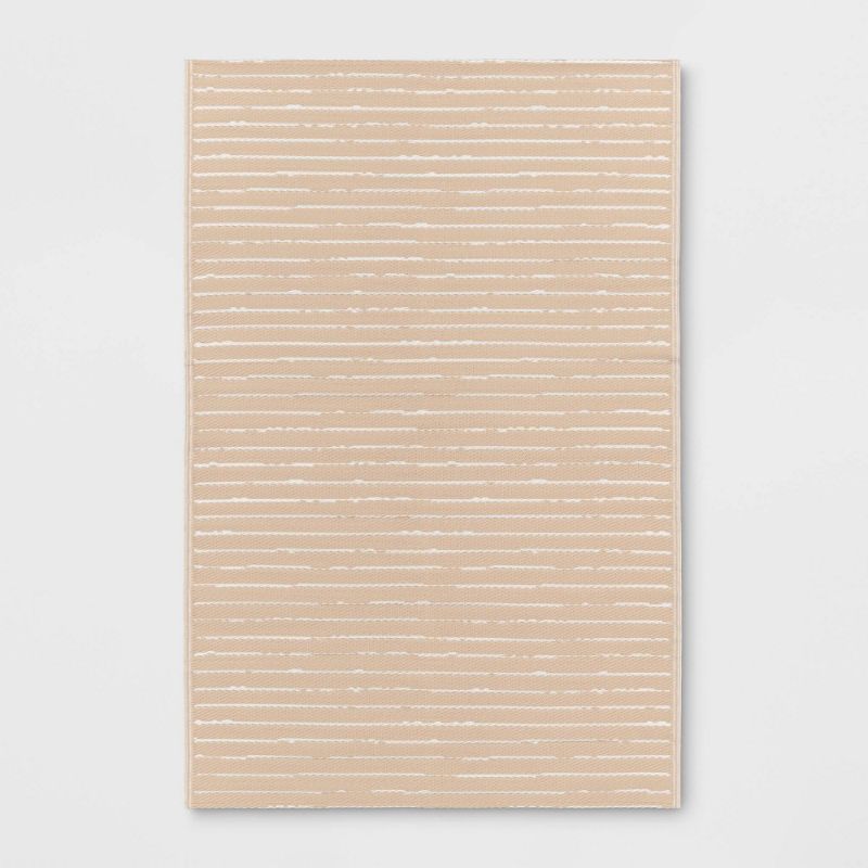 Photo 1 of 4' X 6' Striped Indoor/Outdoor Rug Tan/White - Room Essentials™
