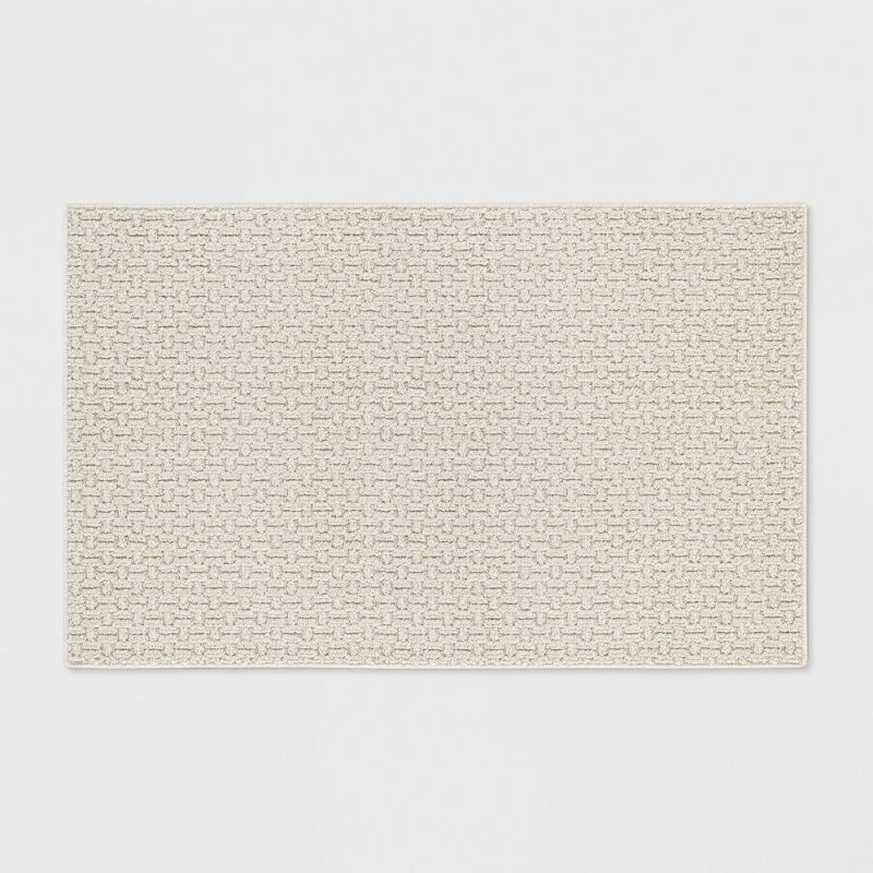 Photo 1 of 2'6"X3'10"/30"X46" Solid Washable Tufted Accent Rug - Made by Design™
