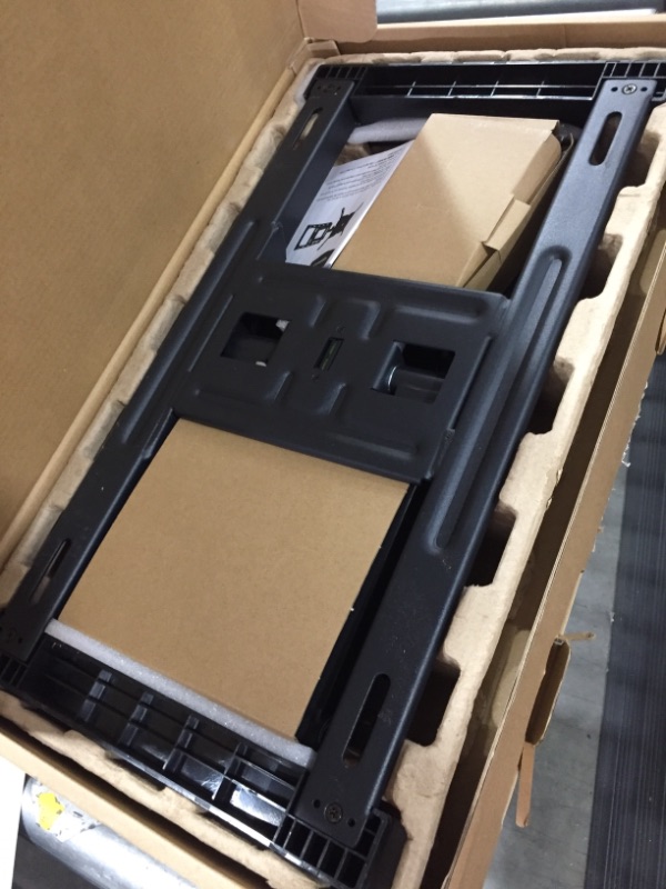 Photo 1 of AMAZONBASICS HEAVY-DUTY, FULL MOTION ARTICULATING TV WALL MOUNT FOR 32-INCH TO 80-INCH LED, LCD, FLAT SCREEN TVS
