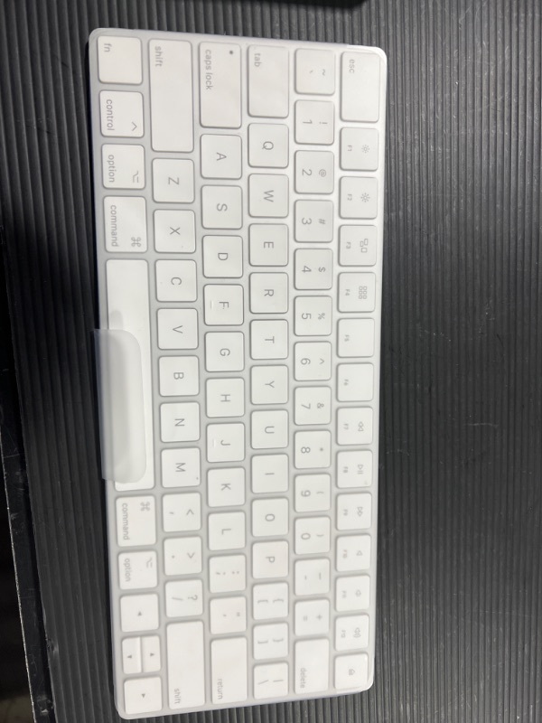 Photo 2 of Apple Magic Keyboard - US English, Includes USB-C to Lighting Cable, White
