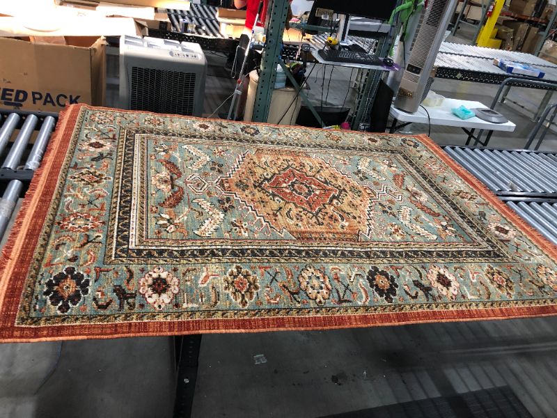 Photo 1 of 84 x 61 inches decorative carpet