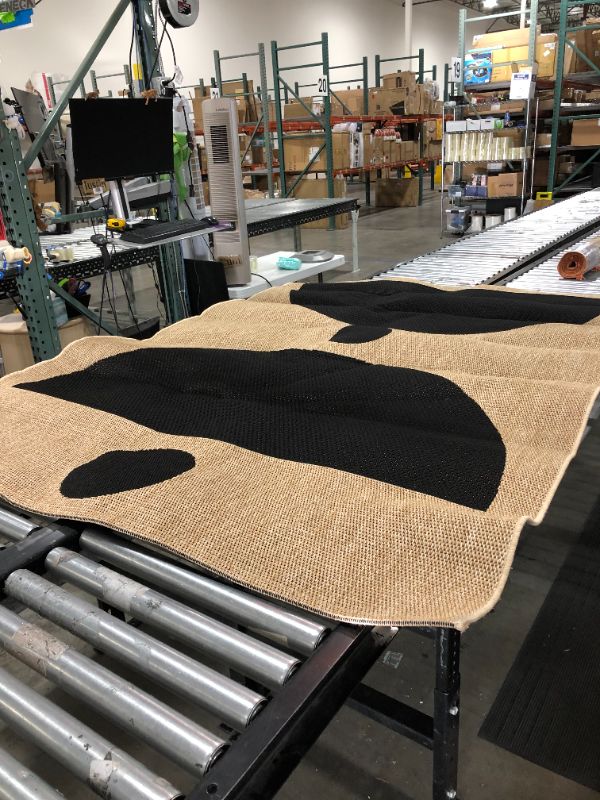 Photo 1 of 83"x62" beige and black rug 