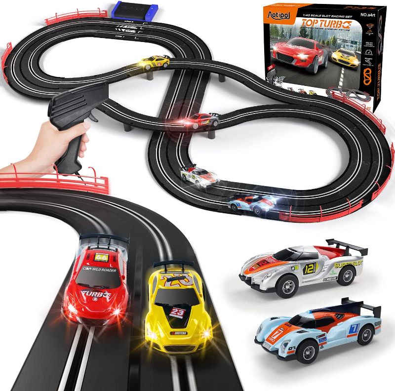 Photo 1 of Electric Racing Tracks for Boys and Kids Including 4 Slot Cars 1:43 Scale with Headlights and Dual Racing, Race Car Track Sets with 2 Hand Controllers, Gift Toys for Children Over 8 Years Old
