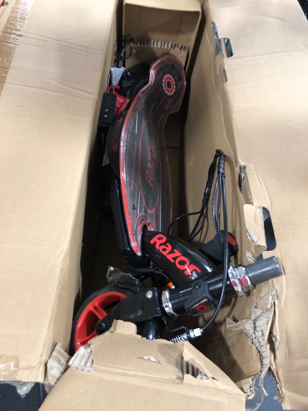 Photo 2 of Razor Power Core E90 Glow Electric Scooter - Hub Motor, LED Light-Up Deck, Up to 10 mph and 60 min Ride Time, for Kids 8+ , Black/Red (Glow)
