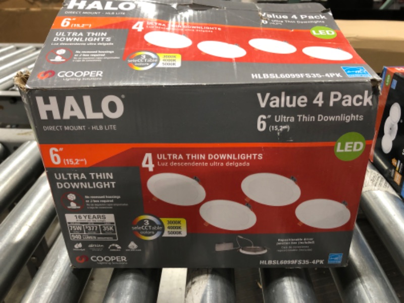 Photo 4 of ASSORTED HALO BRAND LIGHTING, ULTRA-THIN DOWNLIGHTS IN 6 INCH SIZE, TWIN HEAD FLOODLIGHTS, OUTDOOR SECURITY LIGHT. 10 ITEMS TOTAL. OPEN BOXES AND POSSIBLE USE ON SOME ITEMS. 