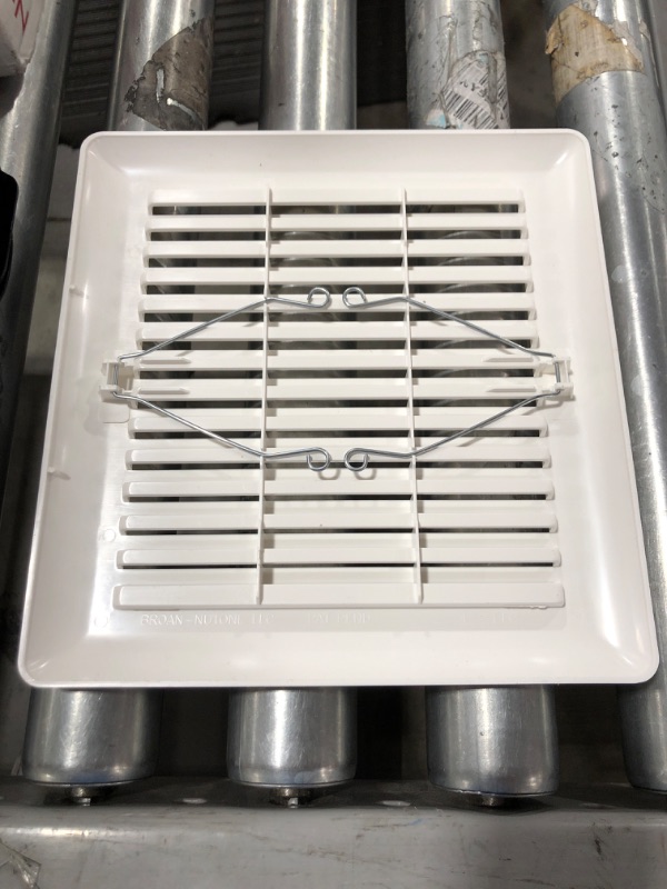 Photo 1 of BROAN-NUTONE 50 CFM Ceiling/Wall Mount Bathroom Exhaust Fan. OPEN BOX.
