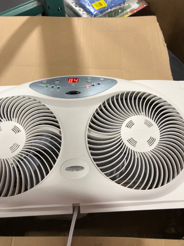 Photo 1 of Bionaire Window Fan with Twin 8.5-Inch Reversible Airflow Blades and Remote Control, White

