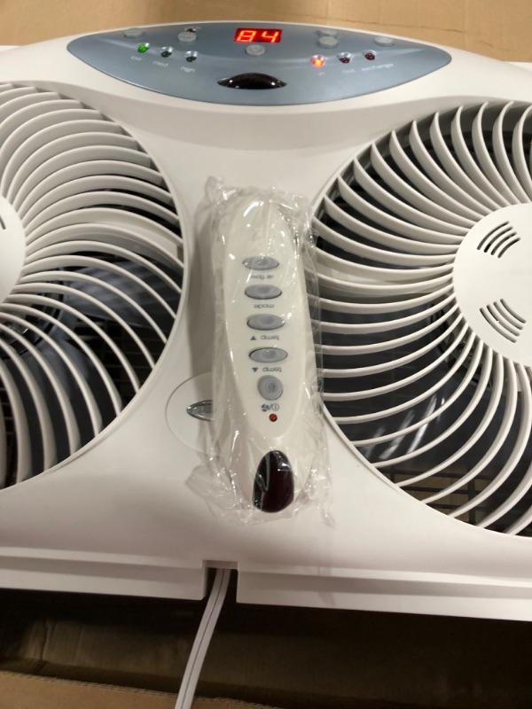 Photo 5 of Bionaire Window Fan with Twin 8.5-Inch Reversible Airflow Blades and Remote Control, White
