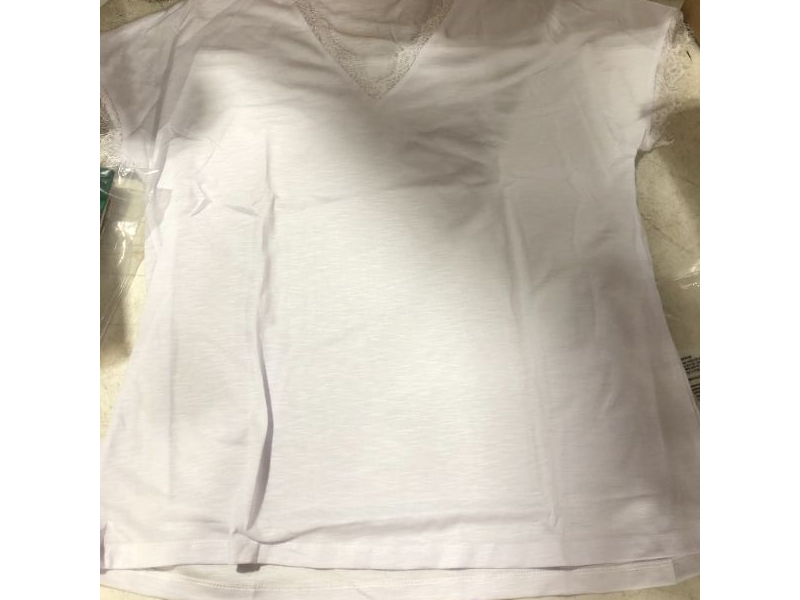 Photo 1 of White tee with lace around the neck a