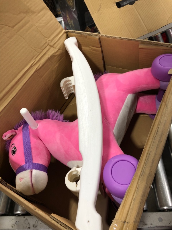 Photo 1 of Rockin' Rider Candy 2-in-1 Pony Ride-on
