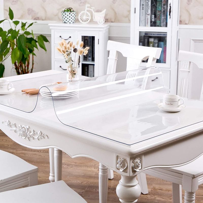 Photo 1 of OstepDecor Upgraded Version 1.5mm Thick Clear Table Cover, 48 x 28 Inch
