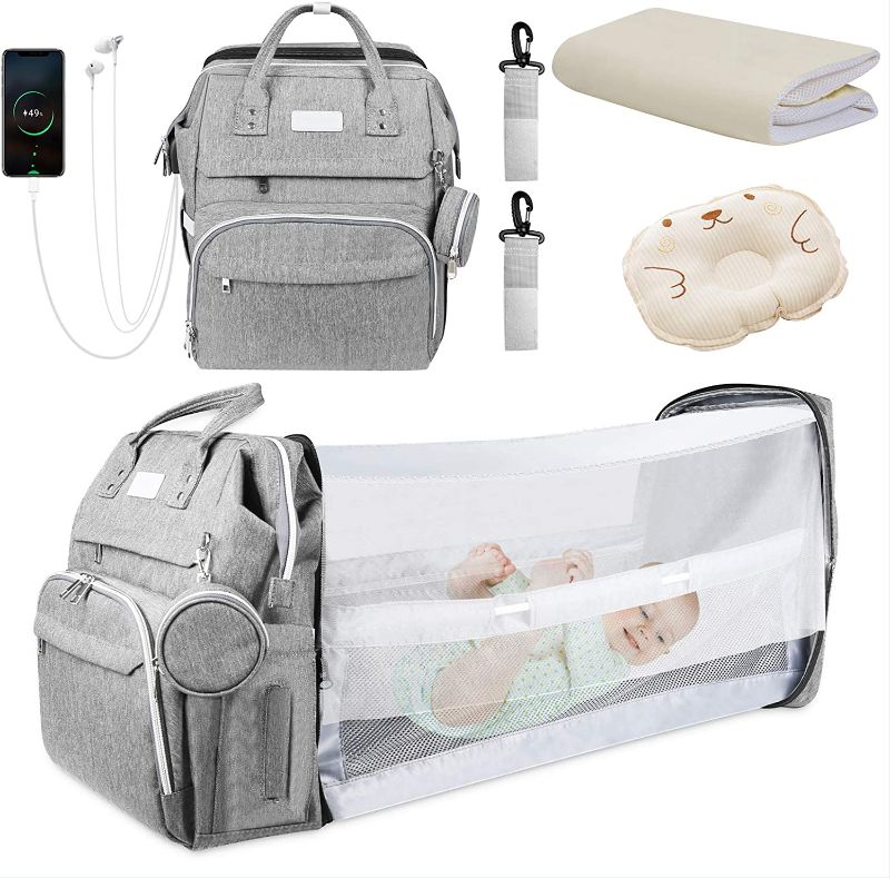 Photo 1 of Diaper bag backpack, Baby Diaper Bags for Baby Girl Boy with Changing Station, Multifunction Mommy Bag of Portable Travel Baby Bed with USB Charging Port Stroller Straps for Moms Dads
