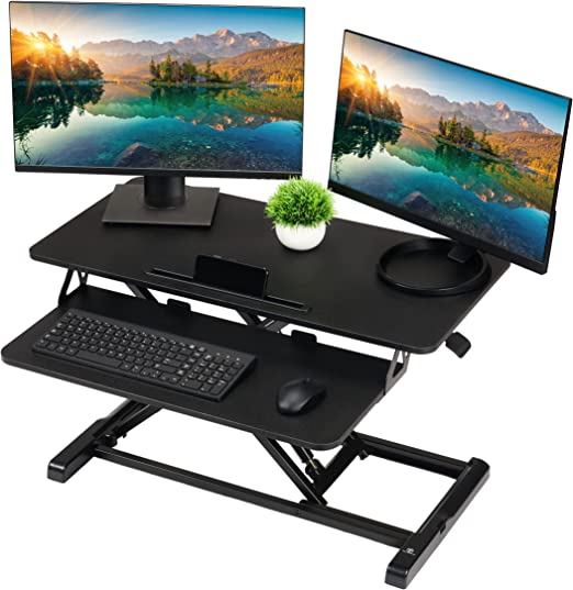 Photo 1 of TechOrbits Standing Desk Converter - Particle Board, Adjustable Height Sit to Stand Up Desk Riser for Home Office - Computer, Laptop & Dual Monitor Workstation & Machine Stand - 32 Inch, Black