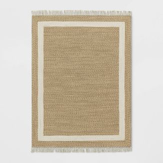 Photo 1 of 5' X 7'' Braided Outdoor Rug with Fringe Neutral/Ivory - Threshold Designed with Studio McGee

