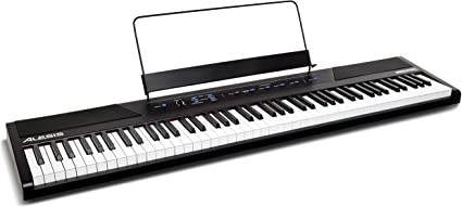 Photo 1 of Alesis Recital – 88 Key Digital Piano Keyboard with Semi Weighted Keys, 2x20W Speakers, 5 Voices, Split, Layer and Lesson Mode, FX and Piano Lessons. MISSING ORIGINAL BOX. PRIOR USE.
