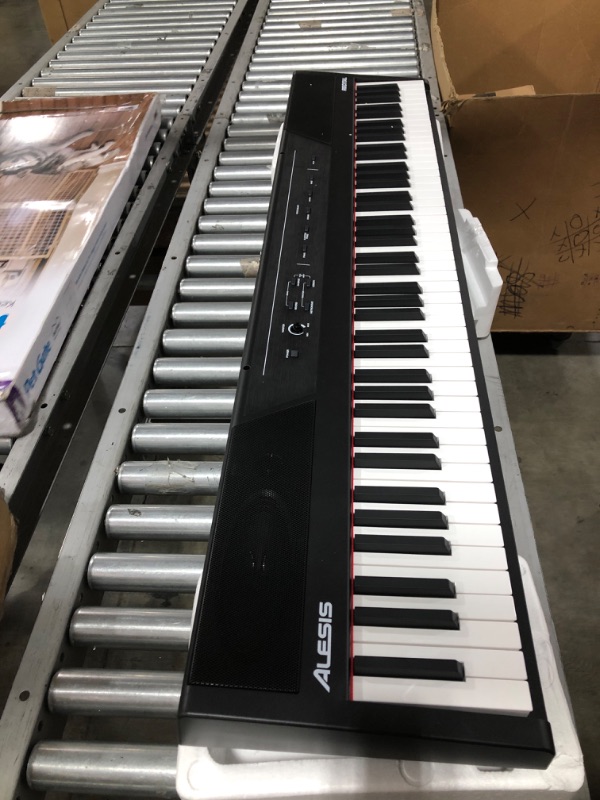 Photo 3 of Alesis Recital – 88 Key Digital Piano Keyboard with Semi Weighted Keys, 2x20W Speakers, 5 Voices, Split, Layer and Lesson Mode, FX and Piano Lessons. MISSING ORIGINAL BOX. PRIOR USE.
