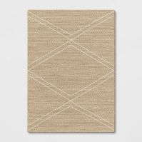 Photo 1 of Braided Diamond Outdoor Rug - Threshold™. 5' X 7'. PRIOR USE. SOME LIGHT STAINS & FRAYING.

