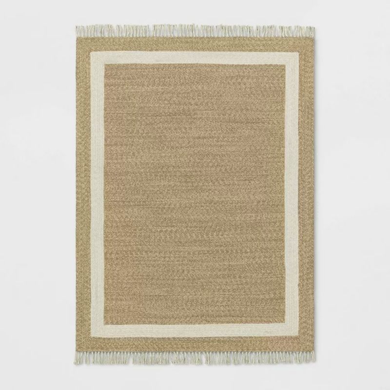 Photo 1 of 5' x 7'' Braided Outdoor Rug with Fringe Neutral/Ivory - Threshold designed with	