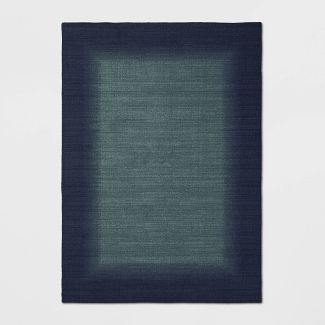 Photo 1 of 5'x7' Good Fashion Border Rug - Room Essentials™
