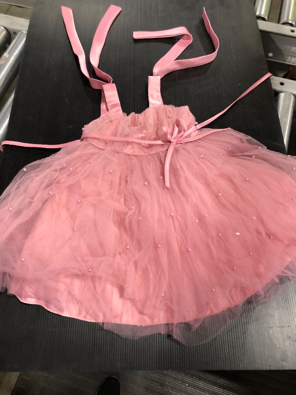 Photo 1 of Pink girls dress with beads on it size unknown looks like a small