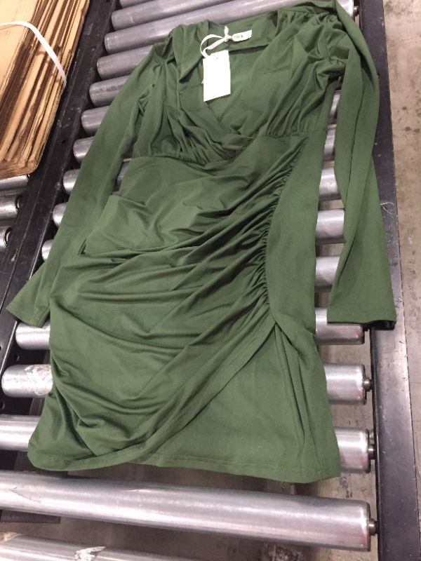 Photo 1 of Long sleeve green dress. Size Medium