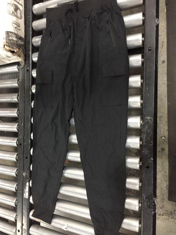 Photo 1 of Black Joggers, size small.