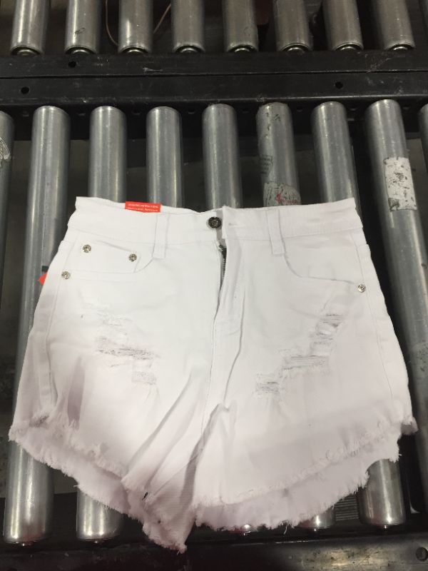 Photo 1 of white distressed shorts. size 4