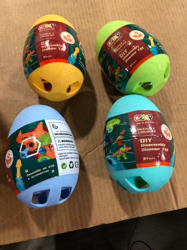 Photo 2 of LiKee Dinosaur Toys Dino Eggs Easter Basket Stuffers STEM Games Engineering Building Play Kits for Kids Toddlers Girls Age 3 4 5 Yrs Old(4 Dinosaurs& 4 Eggs)