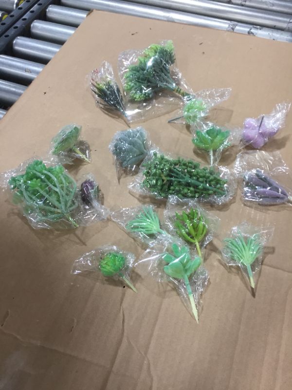 Photo 1 of 16 artificial plants. 