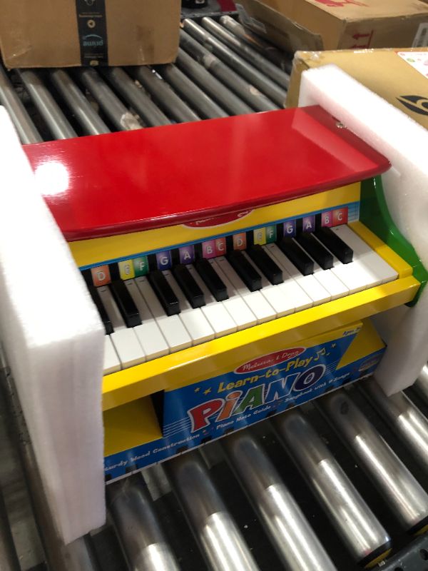 Photo 2 of Melissa & Doug Learn-To-Play Piano With 25 Keys and Color-Coded Songbook
