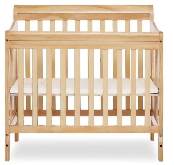 Photo 1 of Aden Natural 4-in-1 Convertible Mini Crib
