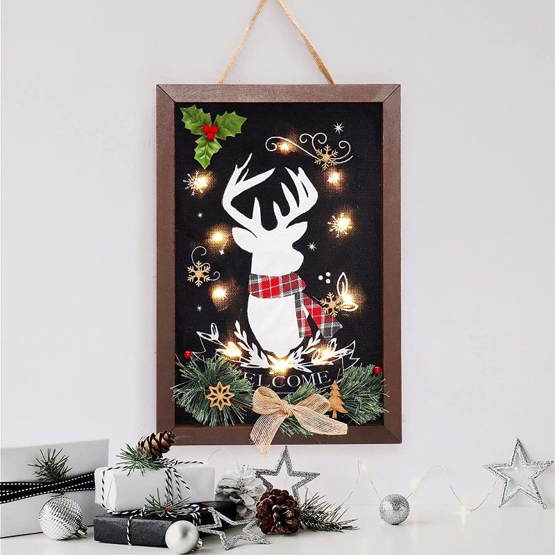 Photo 1 of Christmas Lighted Wall Decor, Rustic Decorative Wood Sign with Reindeer Embroidery Welcome Sign, Wood Hanging Wall Art Xmas Home Decoration - 11 x 16 Inch (Black)