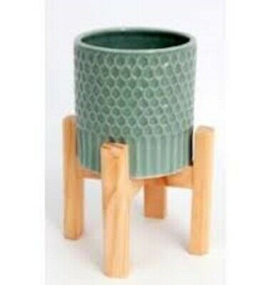 Photo 1 of CERAMIC POT WITH WOODEN STAND, DIFFERS SLIGHTLY FROM STOCK IMAGE