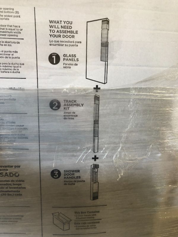 Photo 1 of DELTA 29-1/32 in. x 55-1/2 in. H Sliding Frameless Bathtub Door Panels in Smoked Tinted Glass (for 50 in. - 60 in. Doors)