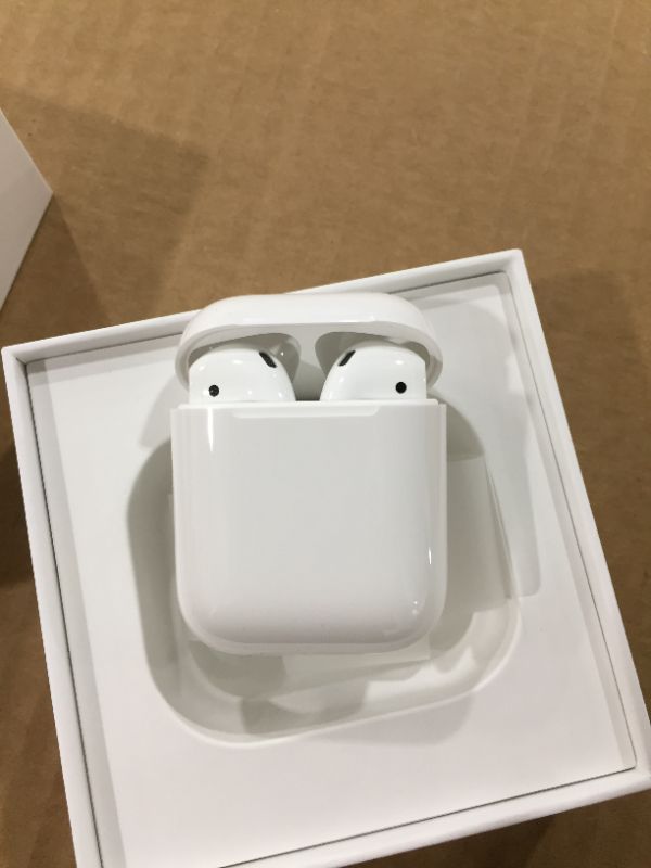 Photo 2 of Apple AirPods (1ST Generation) MV7N2AM/a with Charging Case - Stereo - Wireless - Bluetooth - Earbud - Binaural - in-ear
