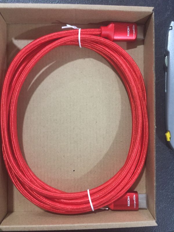 Photo 2 of Amazon Basics 10.2 Gbps High-Speed 4K HDMI Cable with Braided Cord, 10-Foot, Red
