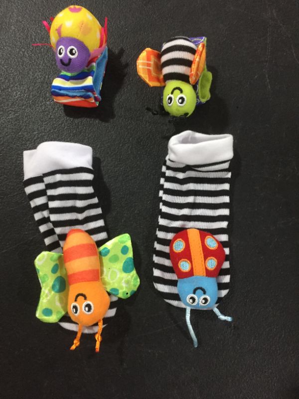 Photo 2 of Coolmade Infant & Baby Puzzle Lovely Socks And Wrist Strap Toy Cartoon Animal Shaped Wrist Rattles Foot Socks Toys 4 pcs
