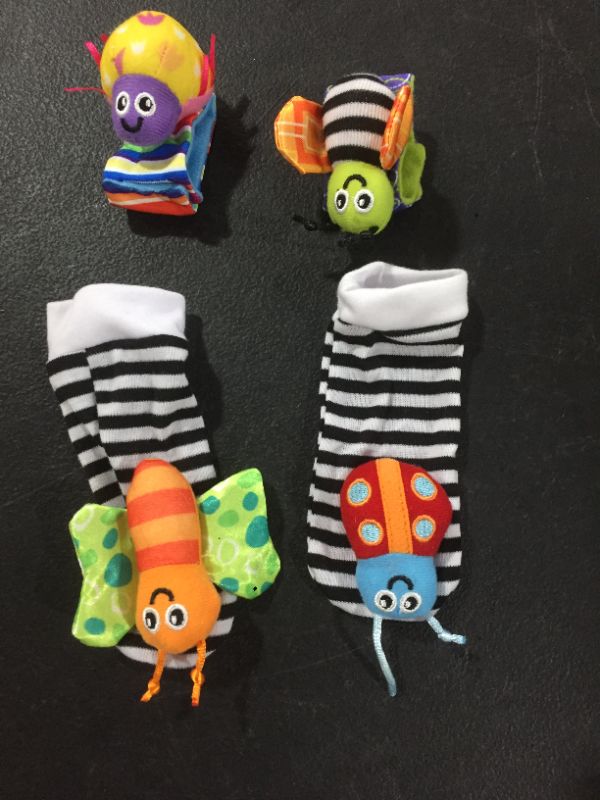 Photo 2 of Coolmade Infant & Baby Puzzle Lovely Socks And Wrist Strap Toy Cartoon Animal Shaped Wrist Rattles Foot Socks Toys 4 pcs