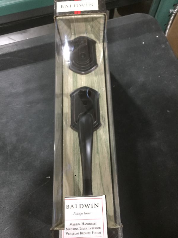Photo 1 of Baldwin Medina Single Cylinder Front Door Handleset Featuring SmartKey Security in Venetian Bronze, Prestige Series with Traditional Door Hardware and Madrina Lever
