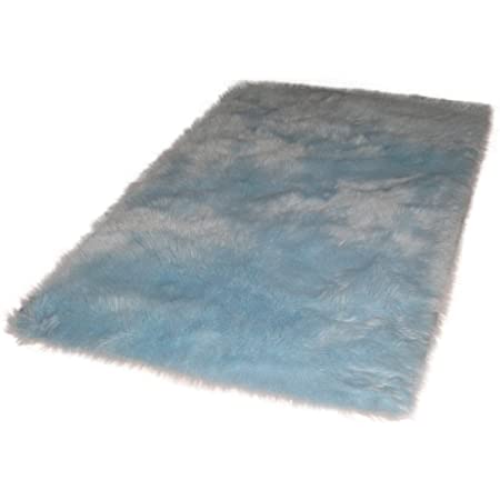 Photo 1 of Faux blue rug 6'8 x 5'3