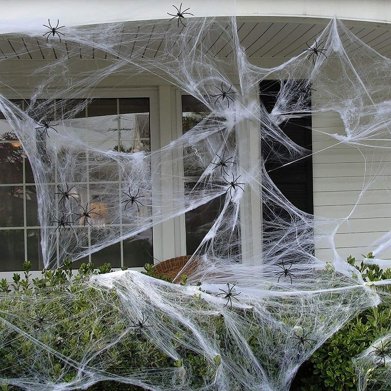 Photo 1 of 90shine 1100 sqft Fake Spider Web Cobweb Halloween Party Outdoor Decorations Supplies with 60 Spiders
