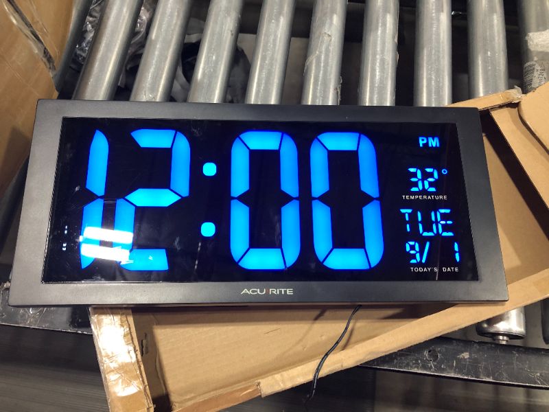 Photo 2 of AcuRite 76100M Oversized LED Clock with Indoor Temperature, Date and Fold-Out Stand 18-Inch Blue
