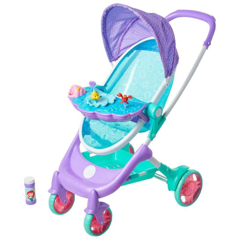 Photo 1 of My Disney Nursery Musical Bubble Baby Doll Stroller Inspired by The Little Mermaid, 4-in-1 Feature Doll Stroller, Forup to 14" Baby Dolls, Blows Bubbles & Plays Under The Sea for Girls Ages 3+
