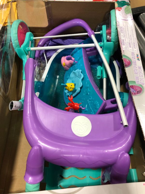 Photo 2 of My Disney Nursery Musical Bubble Baby Doll Stroller Inspired by The Little Mermaid, 4-in-1 Feature Doll Stroller, Forup to 14" Baby Dolls, Blows Bubbles & Plays Under The Sea for Girls Ages 3+
