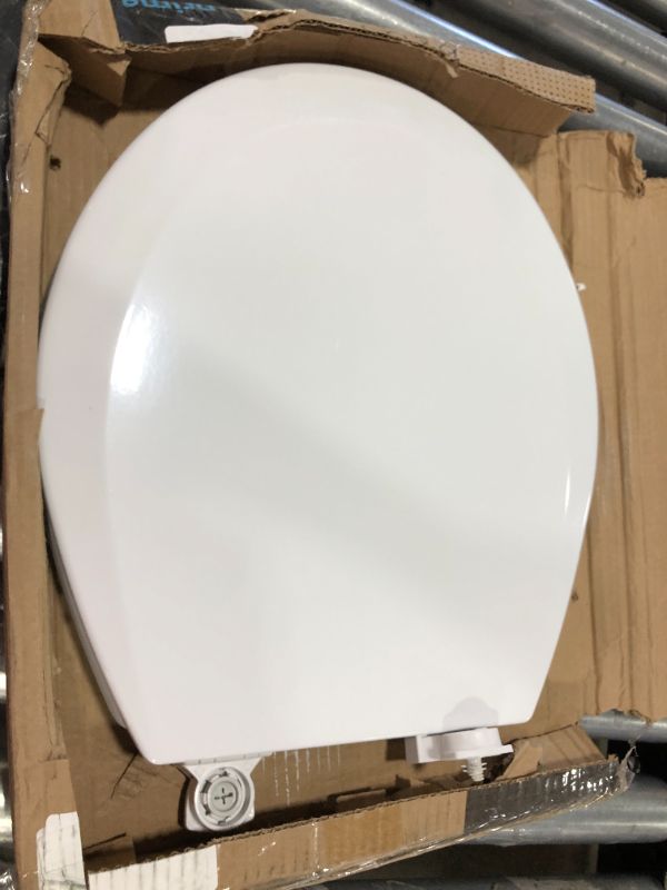 Photo 2 of Closed Front Toilet Seat in White