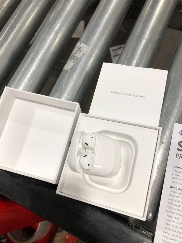 Photo 2 of Apple AirPods (2nd Generation) MV7N2AM/a with Charging Case - Stereo - Wireless - Bluetooth - Earbud - Binaural - in-ear
