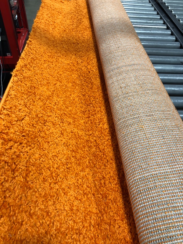 Photo 2 of Contemporary Solid Orange 5 ft. x 7 ft. Shag Area Rug
