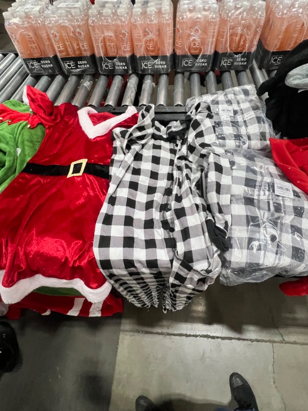 Photo 4 of BOX LOT: 7 onesies (sizes varies), Christmas dress (small), and shirt.