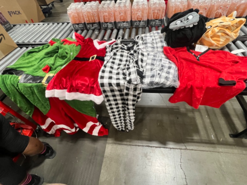 Photo 1 of BOX LOT: 7 onesies (sizes varies), Christmas dress (small), and shirt.